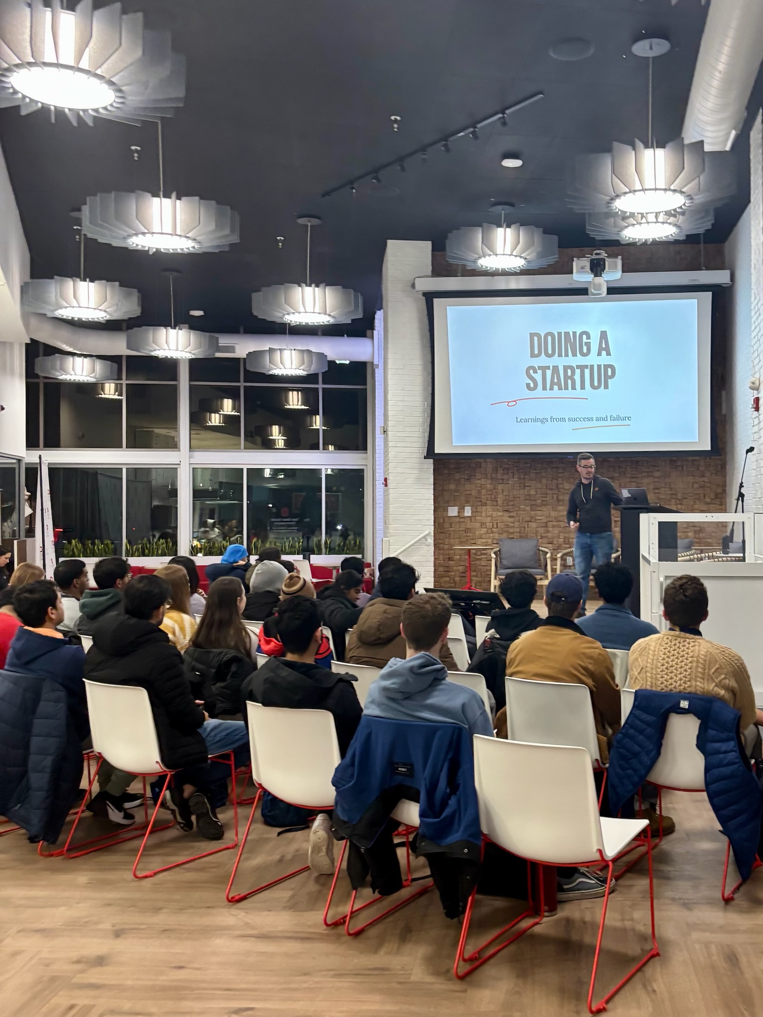 Students in a startup lecture collaborating on product ideas